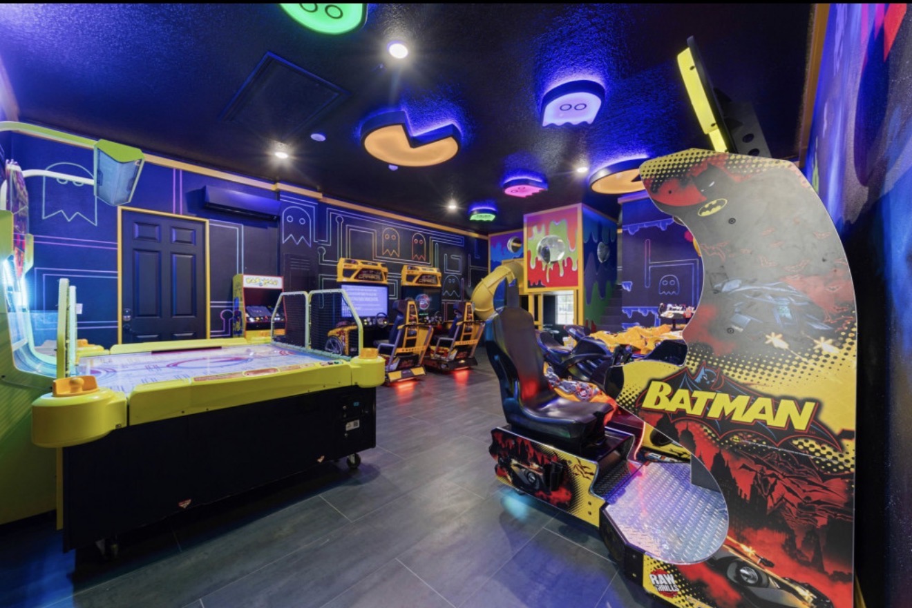 Colorful arcade and game room inside the villa